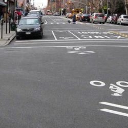 A sharrow designates a traffic lane that is