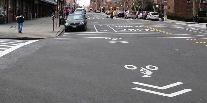 A sharrow designates a traffic lane that is